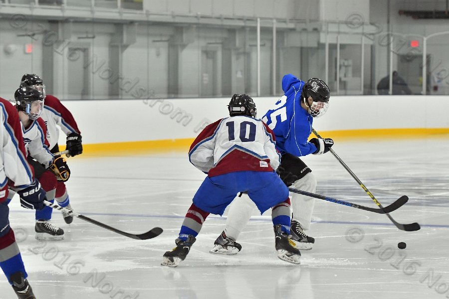 Wheaton College Men\'s Ice Hockey vs Middlesex Community College. - Photo By: KEITH NORDSTROM